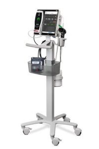 5-parameter cardiac monitor on rent displaying vital signs and multi-jar suction machine for patient home care in Lahore